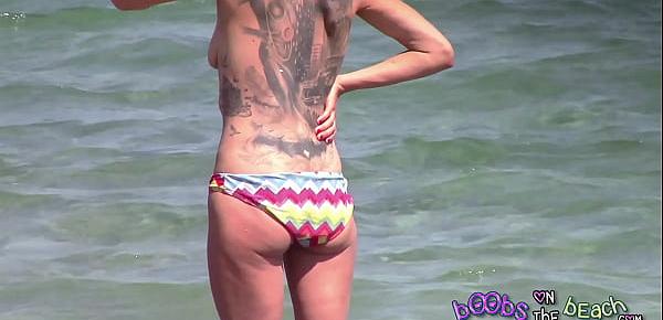  Large Tattoo on back of Skinny German MILF getting angry with her phone sex